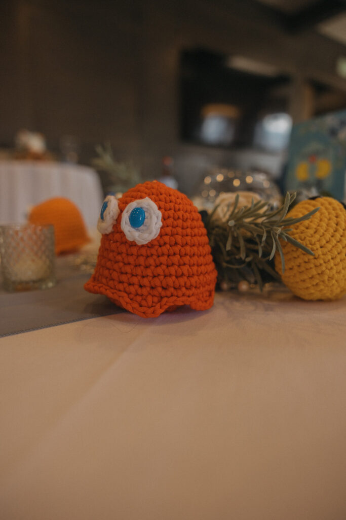 Mario themed plush figures on a wedding reception table. 