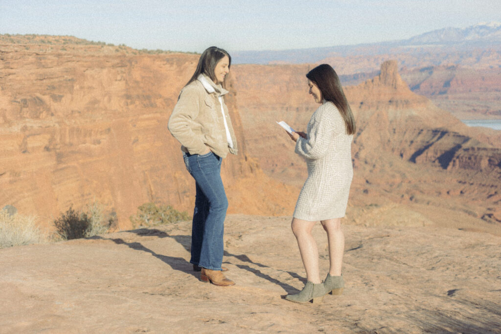 A person reading reading a note to their partner. 